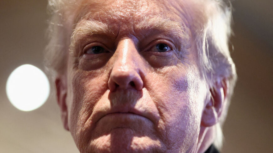 U.S. President Donald Trump looks on as he visits Machine Shed restaurant in Urbandale, Iowa, U.S., January 27, 2026. REUTERS/Kevin Lamarque