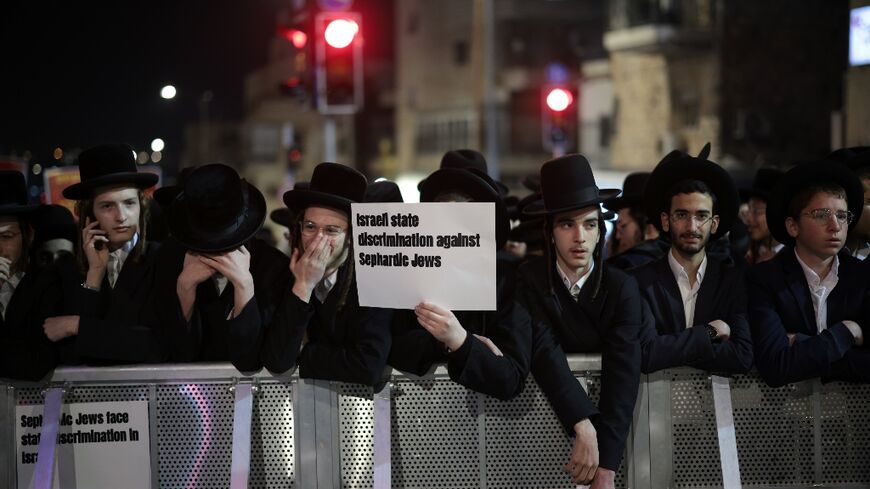Israeli ultra-Orthodox Jewish youths are protesting plans to end their exemption from military service 