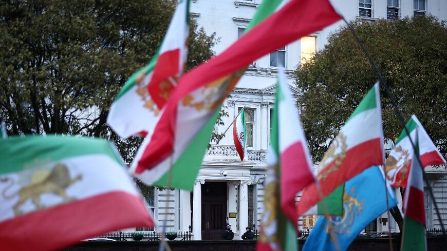 Demonstrators in front of the Iranian embassy in London waved pre-Islamic Revolution flags