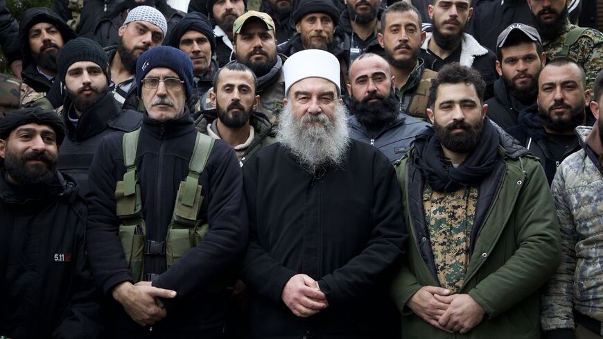 Sheikh Hikmat Salman al-Hijri is pictured at Qanawat, the headquarters of the Druze spiritual presidency, on Dec. 28, 2024, in Suwayda, Syria.