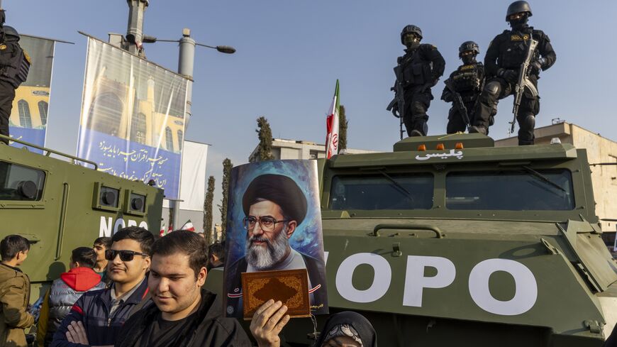 People attend a pro-government rally on Jan. 12, 2026, in Tehran, Iran.