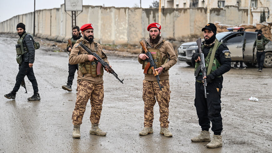 Members of Syrian government takeover the Al-Aqtan prison after Kurdish-led Syrian Democratic Forces (SDF) forces withdraw from al-Aqtan prison, bound for Kobani, on the outskirts of the northeastern Syrian city of Raqqa on Jan. 23, 2026. 