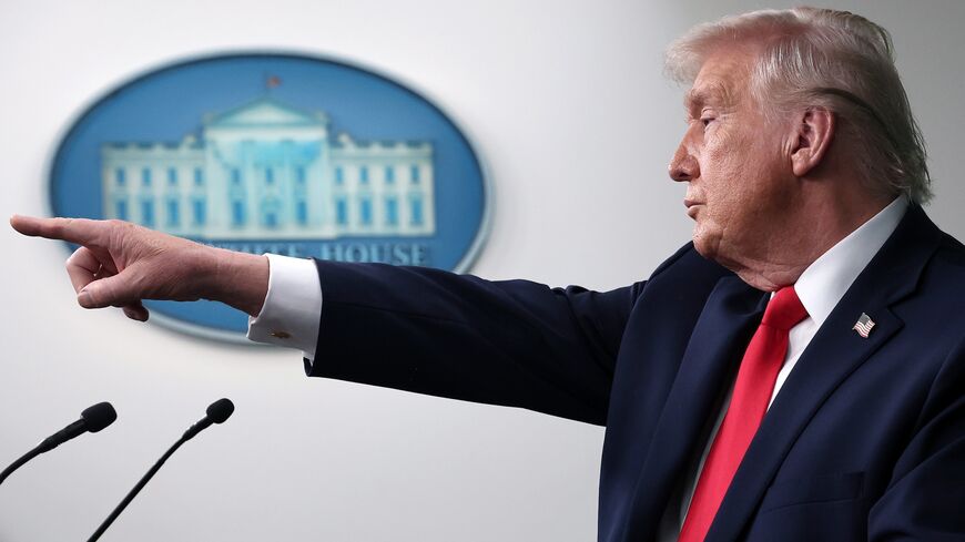 President Donald Trump takes questions from the media during a press briefing on Jan. 20, 2026, in Washington. 