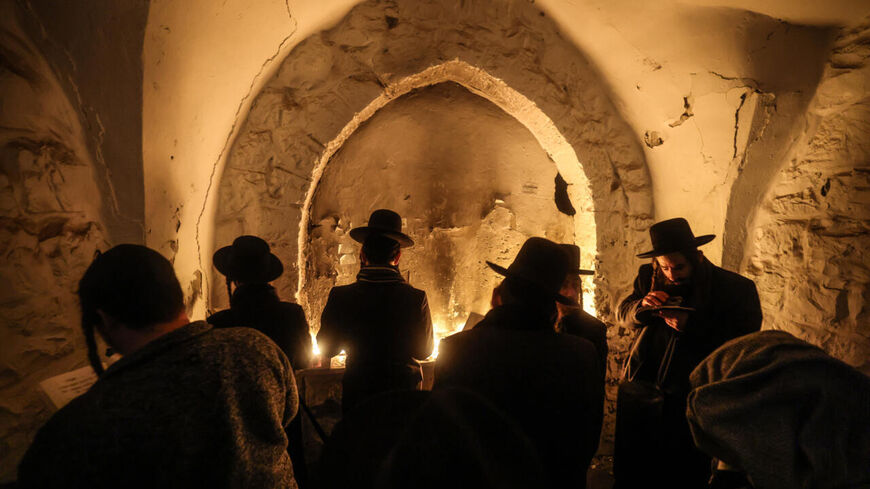 Jewish pilgrims can only visit Joseph's Tomb in groups escorted by troops