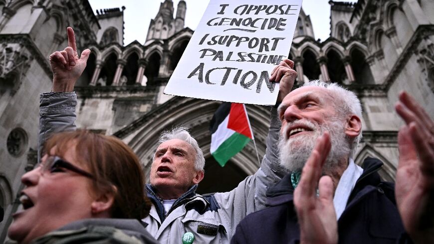 Protestors cheer after the High Court in London rules that a UK ban on the Palestine Action group interfered with the right to freedom of speech