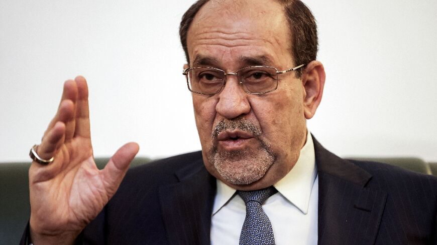 Iraq's candidate for the premiership, Nouri al-Maliki, says he will not withdraw his candidacy after US threats