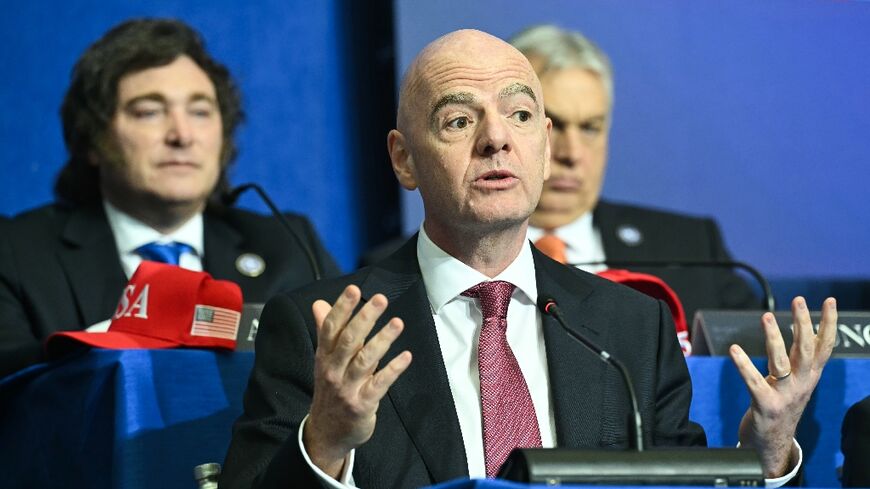 FIFA president Gianni Infantino attending the Board of Peace meeting, with Argentina's President Javier Milei looking on