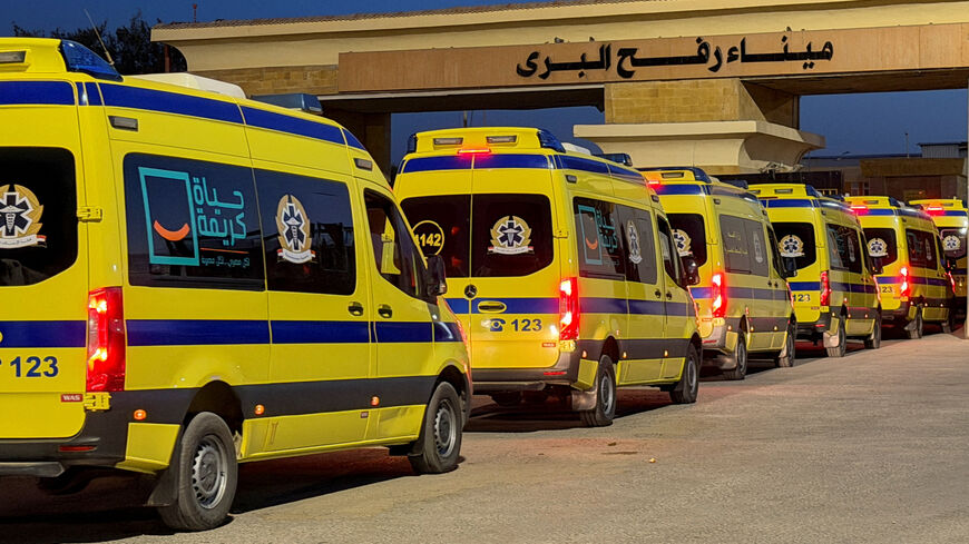 Egyptian ambulances line up to the Gaza Strip through the Rafah border from the Egyptian side, following the first day Israel reopened the border between Gaza and Egypt on Monday for people on foot, in Rafah, Egypt, February 2, 2026. REUTERS/Stringer