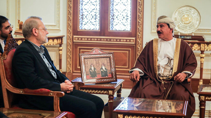 Secretary of the National Security Council, Ali Larijani meets with the Minister of the Royal Office in the Sultanate of Oman, Sultan bin Mohammed al Numani, in Muscat, Oman, February 10, 2026. Iran's National Security Council/WANA (West Asia News Agency)/Handout via REUTERS ATTENTION EDITORS - THIS PICTURE WAS PROVIDED BY A THIRD PARTY.