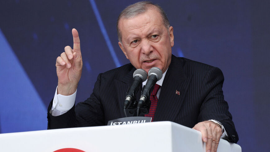 Turkish President Tayyip Erdogan speaks during a ceremony for the handover of new vehicles to the gendarmerie and police forces in Istanbul, Turkey, November 28, 2025. REUTERS/Murad Sezer