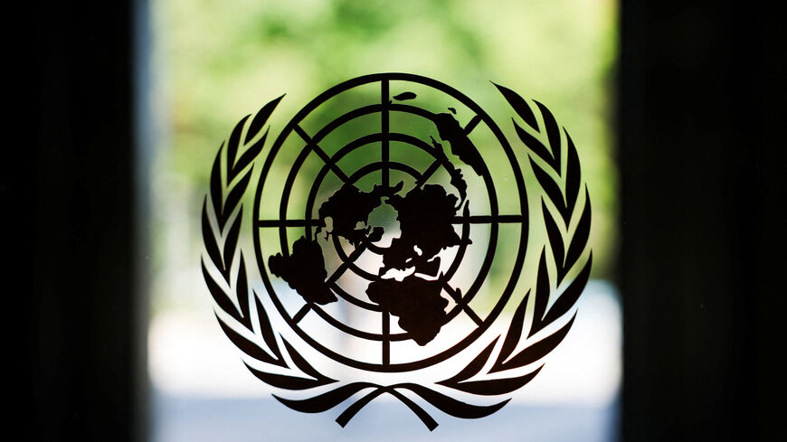 FILE PHOTO: The United Nations logo adorns a window at U.N. headquarters in New York City, U.S., September 18, 2025. REUTERS/Jeenah Moon/File Photo