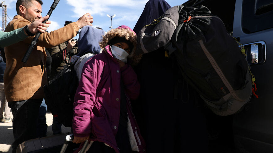 Members of Australian families believed to be linked to the Islamic State militants leave Roj camp near Derik, Syria February 16, 2026. REUTERS/Orhan Qereman