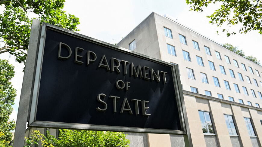 FILE PHOTO: A general view of a U.S. State Department sign outside the U.S. State Department building in Washington, D.C., U.S., July 11, 2025. REUTERS/Annabelle Gordon/File Photo