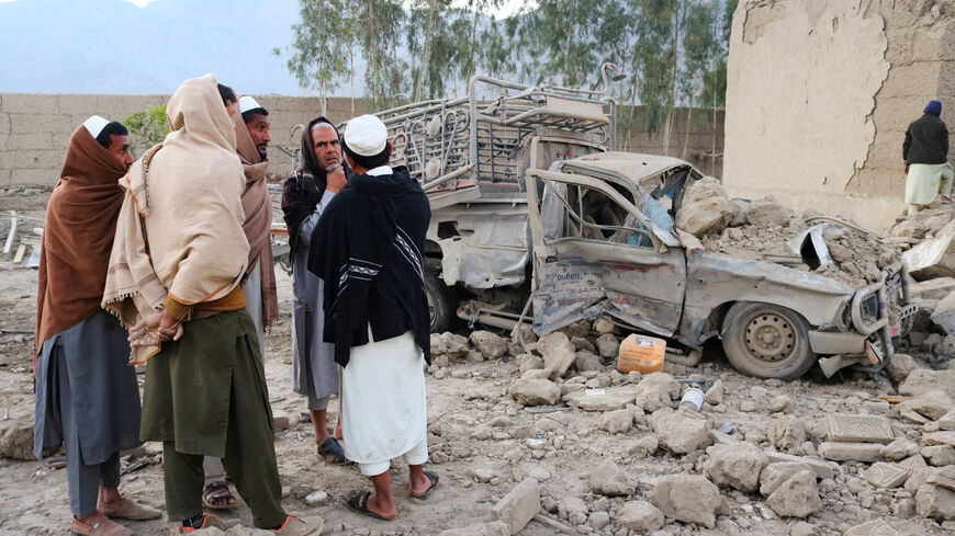 Residents gather at the site, following the Pakistani airstrikes, in Bihsud district, Nangarhar province, Afghanistan, February 22, 2026. REUTERS/Stringer