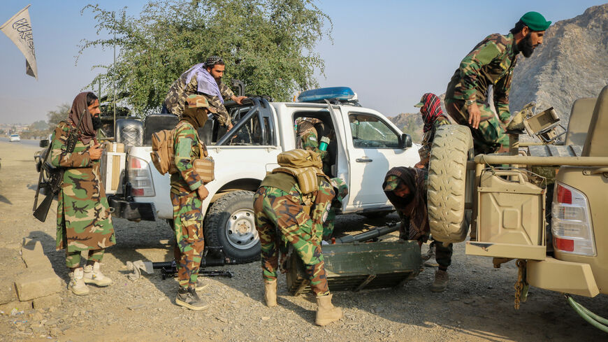 Taliban soldiers load ammunition in a vehicle, following exchanges of fire between Pakistan and Afghanistan forces, near Torkham border, in Afghanistan, February 27, 2026. REUTERS/Stringer