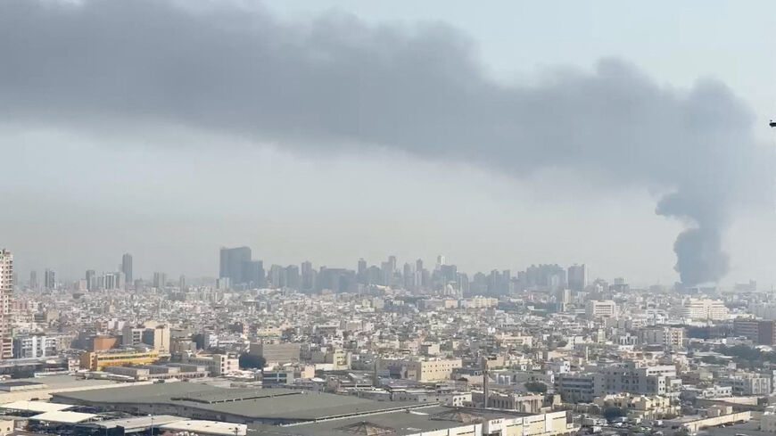 Smoke rises after the state news agency reported a missile attack on the service center of the U.S. Fifth Fleet, following strikes by the United States and Israel against Iran, in Manama, Bahrain, February 28. Video obtained by Reuters/via REUTERS