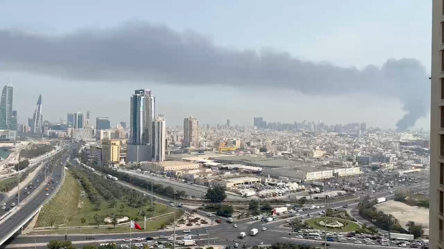 Smoke rises after the state news agency reported missile attack on the service center of the U.S. Fifth Fleet, following strikes by the United States and Israel against Iran, in Manama, Bahrain February 28, 2026, in this still image obtained from a video. Video obtained by Reuters/via REUTERS