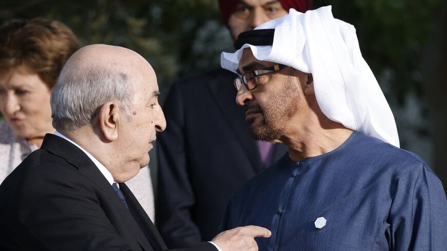 Algeria's President Abdelmadjid Tebboune (L) speaks with UAE President Sheikh Mohamed bin Zayed during the G7 Summit hosted by Italy, in Savelletri, on June 14, 2024.