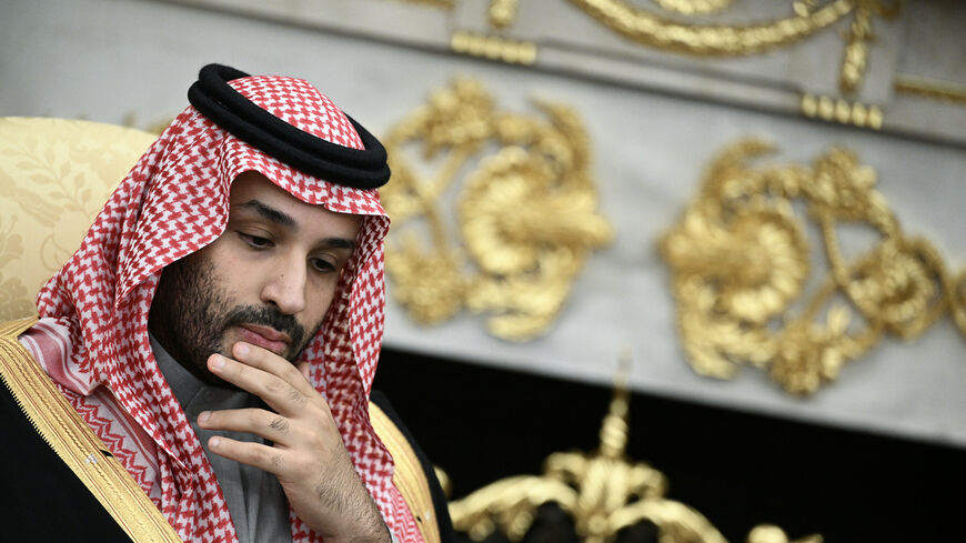 Crown Prince and Prime Minister of the Kingdom of Saudi Arabia Mohammed bin Salman looks on during a meeting with US President Donald Trump (not pictured) in the Oval Office of the White House in Washington, DC on November 18, 2025. Saudi Crown Prince Mohammed bin Salman arrived at the White House to fanfare and a jet flyover Tuesday, in his first visit to the United States since the 2018 murder of journalist Jamal Khashoggi. (Photo by Brendan SMIALOWSKI / AFP) (Photo by BRENDAN SMIALOWSKI/AFP via Getty Ima