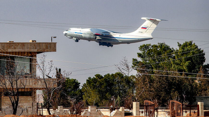 A Russian military Ilyushin Il-76 strategic airlift aircraft takes off from Qamishli International Airport in northeastern Syria's Hasakah province on January 27, 2026. Russia withdrew troops and equipment on January 27 from the airport in Kurdish-held northeast Syria where its forces were based, as Kurdish forces who once controlled swathes of territory in the country's north and east have withdrawn in the face of military pressure of Syrian army advance while the country's new Islamist authorities seek to
