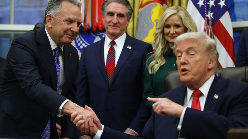 WASHINGTON, DC - JANUARY 29: U.S. Special Envoy to the Middle East Steve Witkoff (L) shakes hands with U.S. President Donald Trump (R) as U.S. Secretary of the Interior Doug Burgum (2L) and Kathryn Burgum (2R) look on in the Oval Office at the White House on January 29, 2026 in Washington, DC. U.S. President Donald Trump signed an executive order to coordinate a federal government response to drug addiction. (Photo by Samuel Corum/Getty Images)