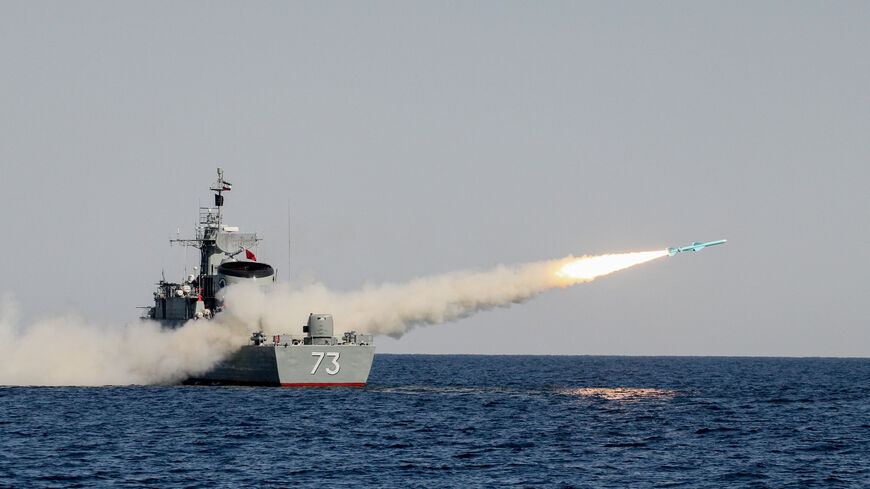 A missile launches from IRIS Sabalan, an Alvand-class frigate of the Iranian Navy, during the Velayat 91 drill in the Gulf of Oman on January 1, 2013. The Velayat 91 drill is a sixday Iranian naval exercise held in late December 2012 and early January 2013 across the Strait of Hormuz, the Sea of Oman, and the northern Indian Ocean to test naval readiness and secure strategic waterways. (Photo by Mohammadali Najib / Middle East Images / AFP via Getty Images)