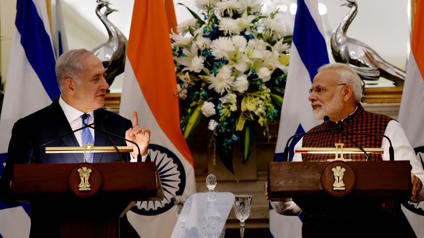 Indian Prime Minister Narendra Modi (R) looks on as Israeli Prime Minister Benjamin Netanyahu speaks during a press conference at Hyderabad House in New Delhi on January 15, 2018. 