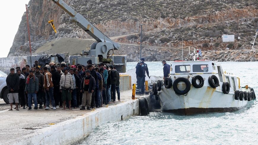 Rescued migrants in Heraklion, southern Crete, on Saturday, after their boat capsized