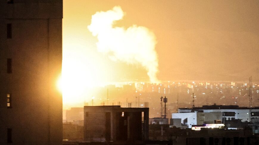 Smoke and fire rise from the site of airstrikes in a central area of the Iranian capital Tehran on March 6, 2026