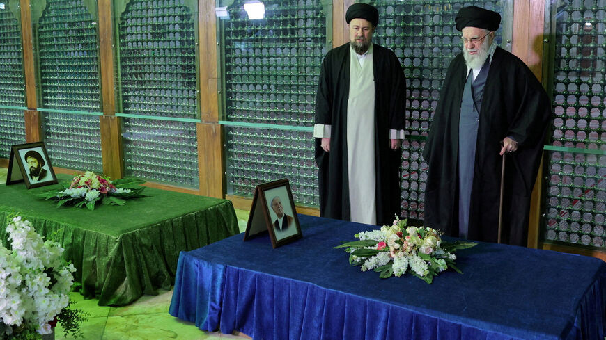 FILE PHOTO: Iran's Supreme Leader Ayatollah Ali Khamenei and Ayatollah Ruhollah Khomeini's grandson, Hassan Khomeini look on as they visit the shrine of the leader of Iran's 1979 Islamic Revolution, Ayatollah Ruhollah Khomeini, in southern Tehran, Iran, January 31, 2026. Office of the Iranian Supreme Leader/WANA (West Asia News Agency)/Handout via REUTERS ATTENTION EDITORS - THIS PICTURE WAS PROVIDED BY A THIRD PARTY./File Photo