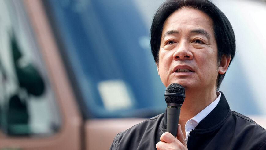 FILE PHOTO: Taiwan President Lai Ching-te delivers a speech after inspecting reservists operating a Taiwan made Hummer 2 Drone during a training session at Loung Te Industrial Parks Service Center in Yilan, Taiwan December 2, 2025. REUTERS/Ann Wang/File Photo