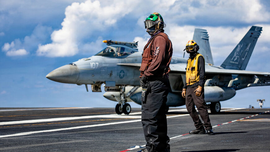U.S. Navy sailors observe flight deck operations on the aircraft carrier USS Gerald R. Ford while operating in support of the Operation Epic Fury attack on Iran in the eastern Mediterranean Sea, March 2, 2026. U.S. Navy/Handout via REUTERS