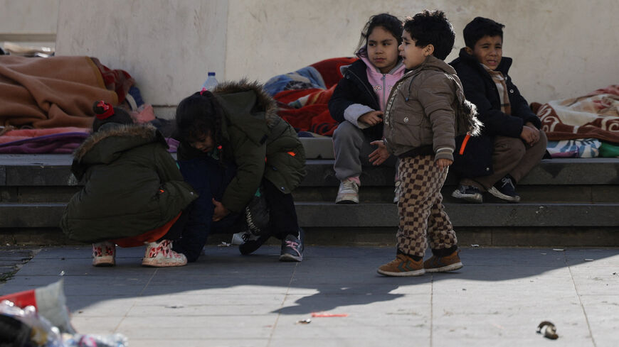 Children displaced from the southern suburbs of Beirut after the Israeli army's warning prompted residents to evacuate, following an escalation between Hezbollah and Israel amid the U.S.-Israeli conflict with Iran, rest at Martyrs' Square in Beirut, Lebanon, March 6, 2026. REUTERS/Khalil Ashawi