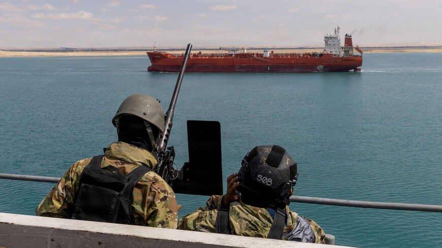 U.S. Navy sailors stand small craft action team watch on a catwalk of the aircraft carrier USS Gerald R. Ford as it transits the Suez Canal, en route to support the Operation Epic Fury attack on Iran, in Egypt March 5, 2026. U.S. Navy/Handout via REUTERS