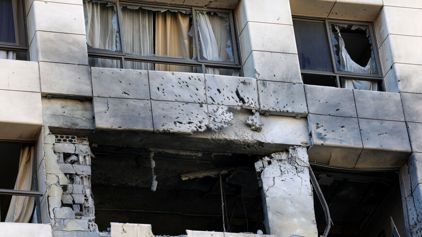 Damaged apartment in the Ramada Plaza hotel building in the aftermath of an Israeli strike, following an escalation between Hezbollah and Israel amid the U.S.-Israeli conflict with Iran, in central Beirut, Lebanon, March 8, 2026. REUTERS/Claudia Greco