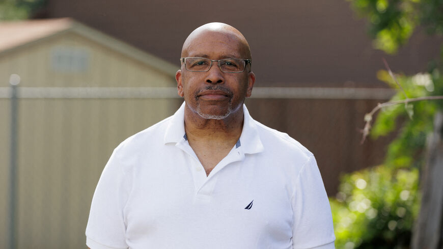 FILE PHOTO: Herman Sims, trucking night operations manager, poses for a portrait outside of his home in Dallas, Texas, U.S., May 13, 2025. REUTERS/Shelby Tauber/File Photo