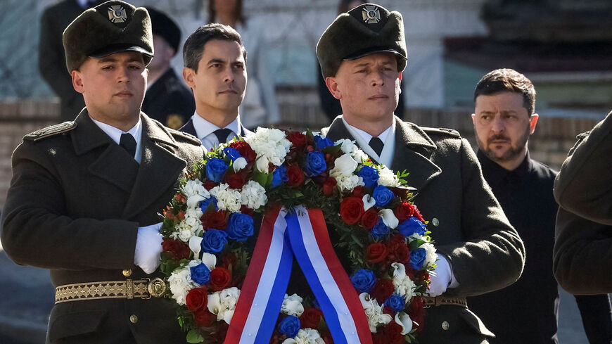 Dutch Prime Minister Rob Jetten and Ukraine's President Volodymyr Zelenskiy visit the Wall of Remembrance to pay tribute to Ukrainian soldiers who were killed, amid Russia's attack on Ukraine, in Kyiv, Ukraine March 8, 2026. REUTERS/Gleb Garanich     TPX IMAGES OF THE DAY