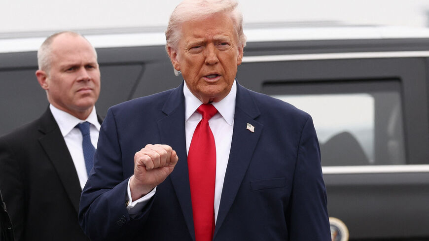 U.S. President Donald Trump gestures as he arrives for a dignified transfer ceremony, in Dover, Delaware, U.S., March 7, 2026. REUTERS/Kevin Lamarque