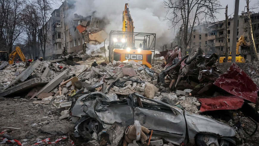 Rescuers work at the site of an apartment building hit by a Russian missile strike, amid Russia's attack on Ukraine, in Kharkiv, Ukraine March 7, 2026.  REUTERS/Vyacheslav Madiyevskyy