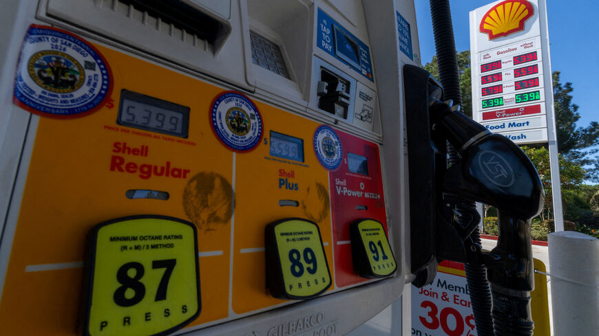 FILE PHOTO: Gasoline prices are displayed on a gas pump in Del Mar, California, U.S., March 3, 2026. REUTERS/Mike Blake/File Photo