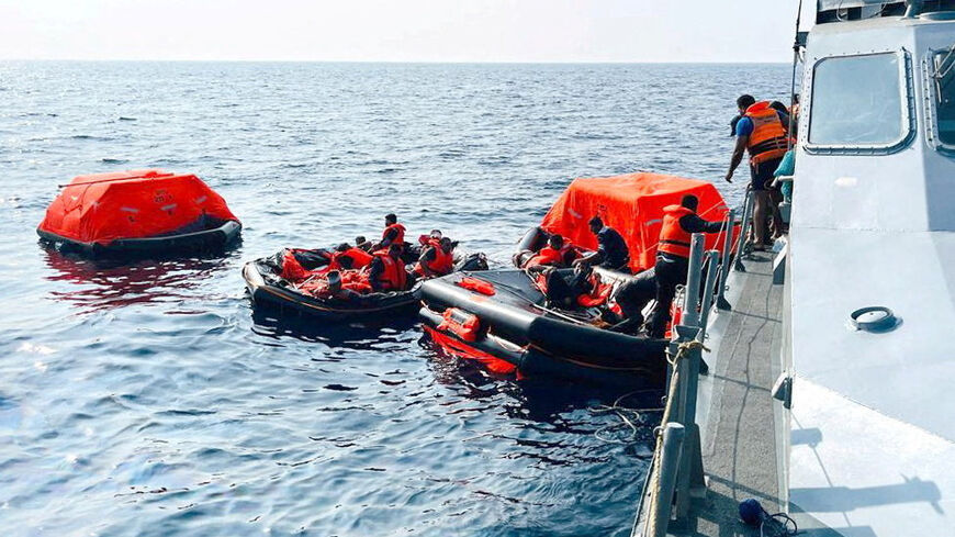 Sri Lanka Navy personnel assist Iranian sailors during a rescue operation after responding to a distress call from their vessel, the Iranian military ship, IRIS Dena, while at sea within Sri Lanka’s maritime search and rescue region, in Indian Ocean, Sri Lanka, March 4, 2026. Sri Lanka Navy/Handout via REUTERS