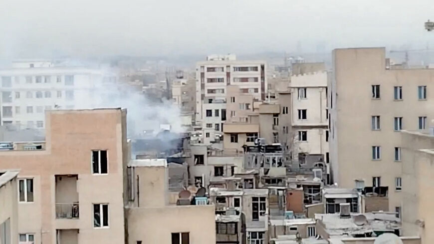 Smoke rises from a building following a reported strike, amid the U.S.-Israeli conflict with Iran, in Tehran, Iran in this screen grab obtained from social media video released March 11, 2026. Social Media/via REUTERS