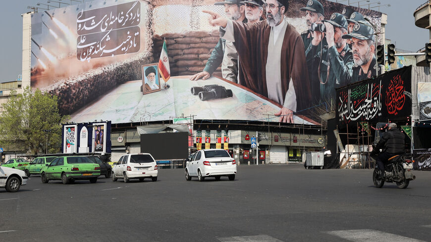 Cars pass a banner featuring Iran's new Supreme Leader Mojtaba Khamenei, amid the U.S.-Israeli conflict with Iran, in Tehran, Iran, March 14, 2026. Majid Asgaripour/WANA (West Asia News Agency) via REUTERS