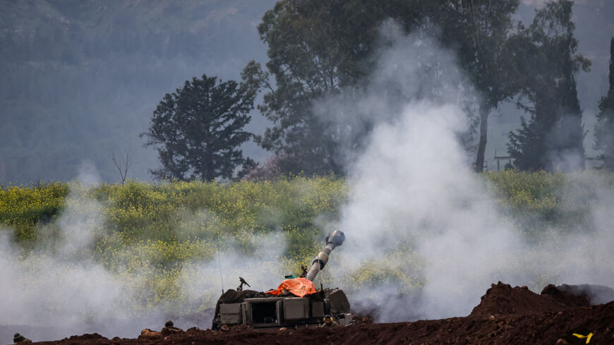 Israeli soldiers use an artillery unit, amid escalation between Hezbollah and Israel, and amid the U.S.-Israeli conflict with Iran, on the Israeli side of the Israel-Lebanon border, March 15, 2026. REUTERS/Shir Torem
