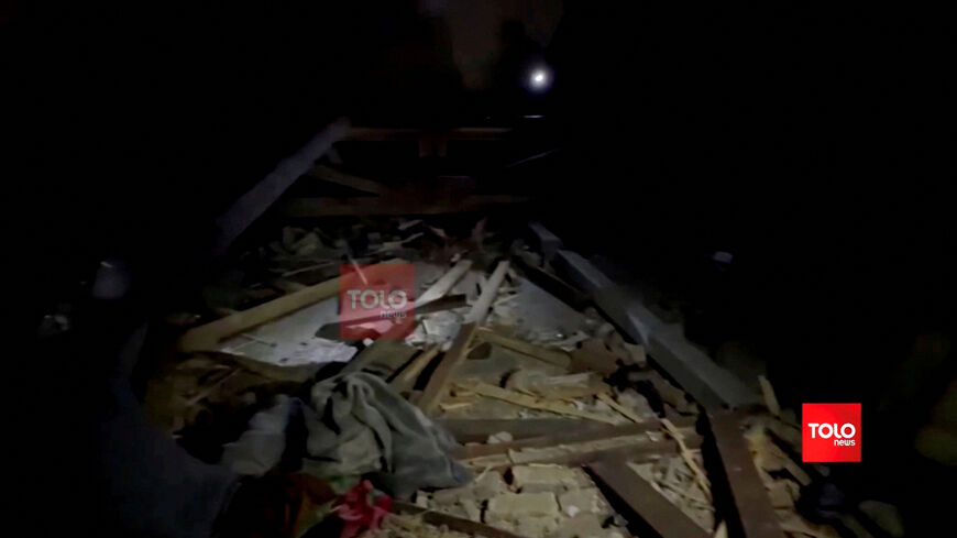 Debris lies on the ground following what the Afghan Taliban government says is an air strike by Pakistan on a drug users rehabilitation hospital in Kabul, Afghanistan, March 16, 2026 in this still image taken from video.   Tolo News Handout via X/Handout via REUTERS