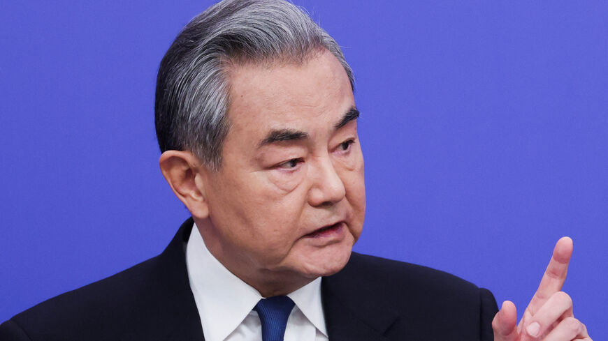 FILE PHOTO: Chinese Foreign Minister Wang Yi attends a press conference on the sidelines of the National People's Congress (NPC), in Beijing, China, March 8, 2026. REUTERS/Maxim Shemetov/File Photo