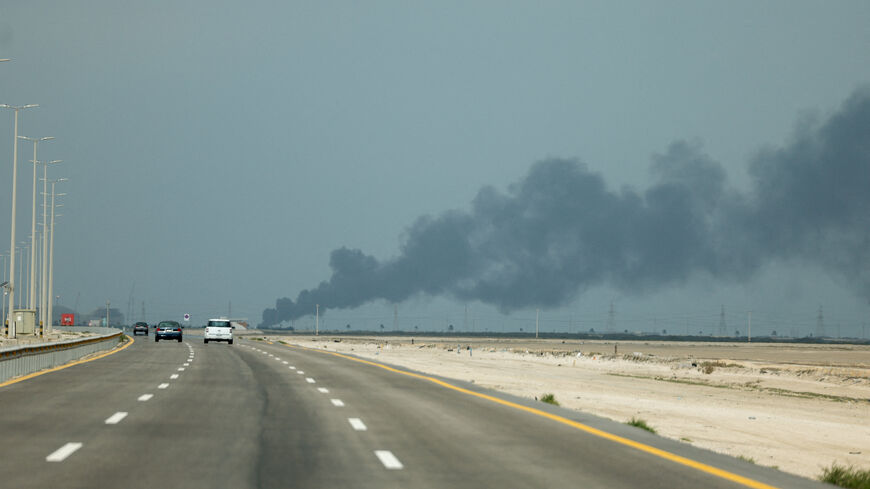 FILE PHOTO: Smoke billows from Saudi Aramco's Ras Tanura oil refinery after a reported Iranian drone strike, amid the U.S.-Israel conflict with Iran, in Ras Tanura, Saudi Arabia, March 2, 2026. REUTERS/Stringer/File Photo