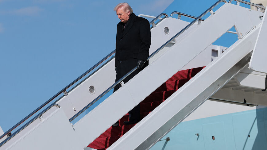 U.S. President Donald Trump disembarks Air Force One as he arrives at Joint Base Andrews, Maryland, U.S., March 18, 2026. REUTERS/Kylie Cooper