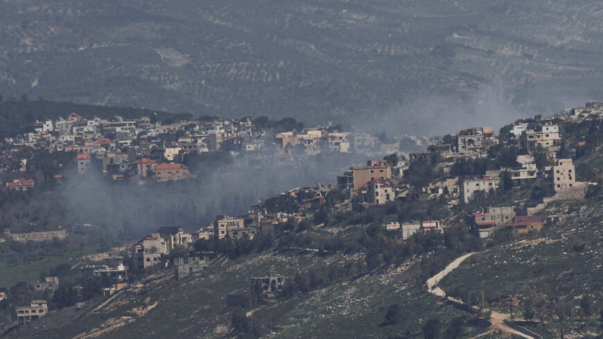 Smoke rises from a Lebanese village near the border with Israel, amid escalation between Iran-backed Hezbollah and Israel, and amid the U.S.-Israeli conflict with Iran, as seen from northern Israel, March 19, 2026. REUTERS/Tyrone Siu