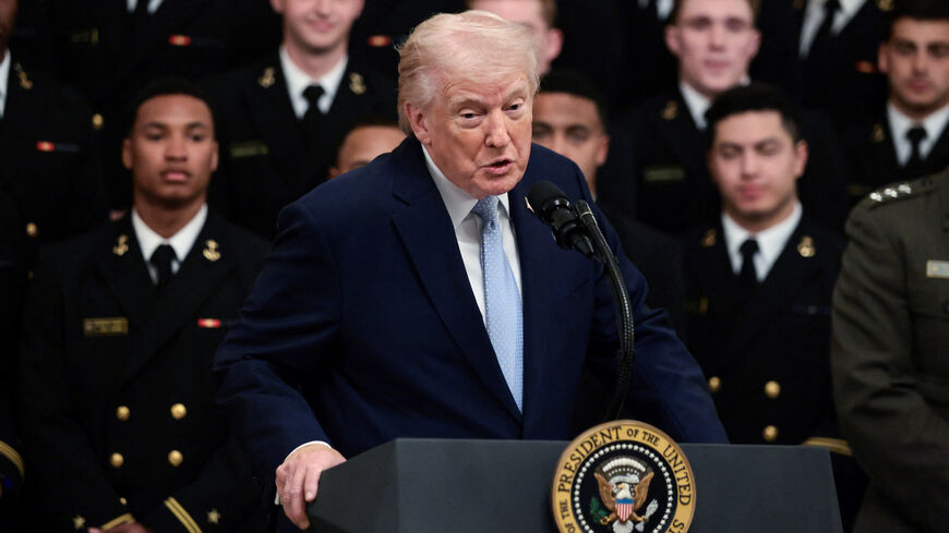 U.S. President Donald Trump delivers remarks during a presentation of the Commander-in-Chief's trophy to the U.S. Navy Midshipmen football team of the United States Naval Academy, at the White House in Washington, D.C., U.S., March 20, 2026. REUTERS/Evelyn Hockstein